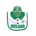 Lansdowne Sports Ireland Rugby Style Baby Bib One Size – front view – white cotton bib with green trim, printed collar, and shamrock crest.