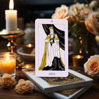 The Golden Path Tarot card Justice displayed with candles and flowers
