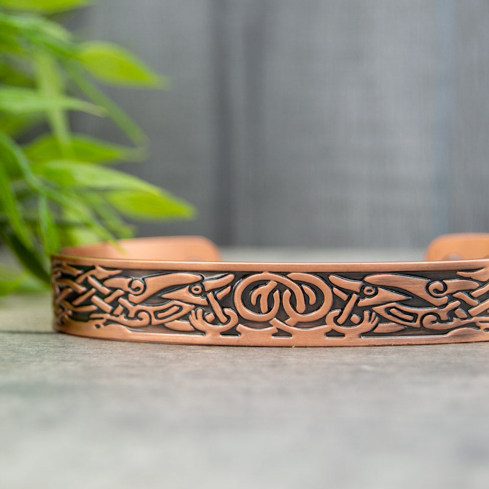 Magnetic Mobility Clover Copper Bracelet – side view – embossed copper cuff with Celtic knot and bird motifs