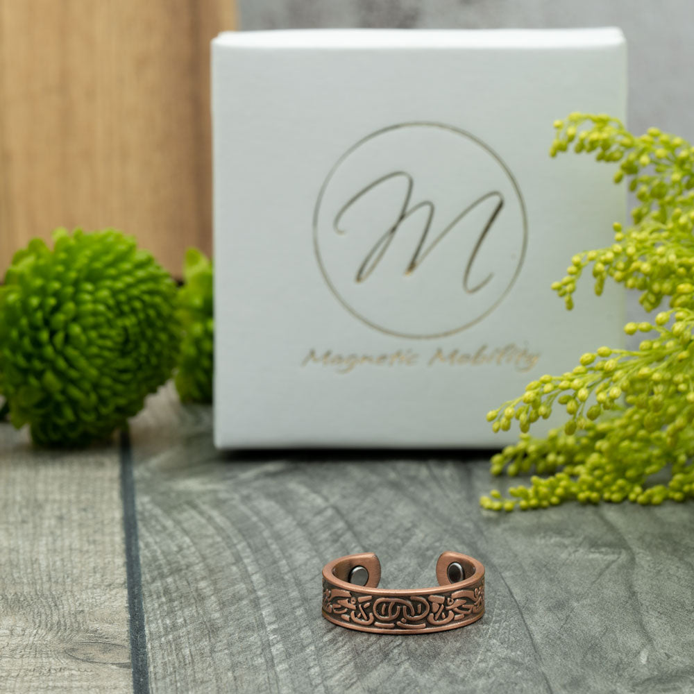 Magnetic Mobility Clover Copper Ring - presentation view - ring inside a branded white and gold gift box.