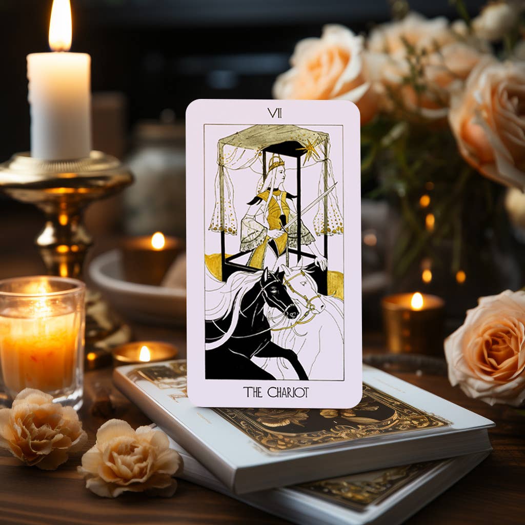 Dark Synevyr The Golden Path Tarot Deck 80 Cards - card The Chariot standing on deck box with candle background