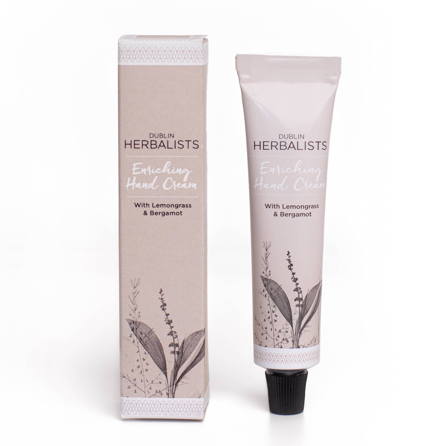 Dublin Herbalists Lemongrass and Bergamot Hand Cream 30ml - tube standing next to botanical packaging box
