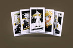 Fan of five Golden Path Tarot cards showing black and gold Art Deco illustrations