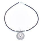 Meninas Bonitas Cork Handmade Cork Necklace 42cm – detail – front view of the brown cork necklace with a round silver-tone pendant.