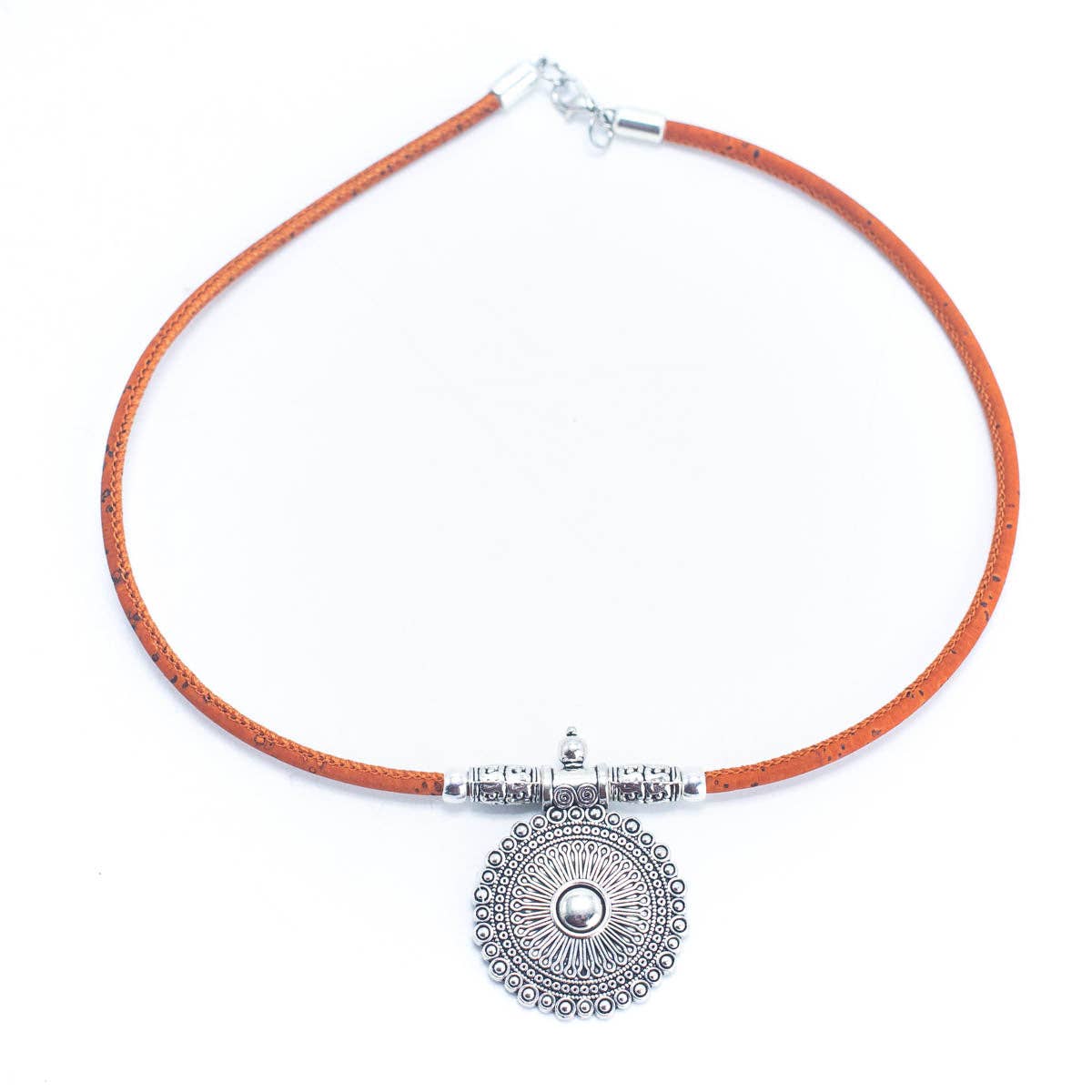 Meninas Bonitas Cork Handmade Cork Necklace 42cm – detail – front view of the orange cork necklace with a round silver-tone pendant.