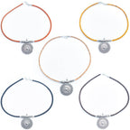 Meninas Bonitas Cork Handmade Cork Necklace 42cm – front view – a group of five cork necklaces in various colours: orange, yellow, natural, black, and brown.