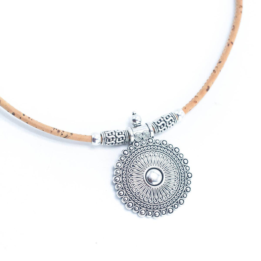 Meninas Bonitas Cork Handmade Cork Necklace 42cm – detail – close-up view of the intricate silver-tone zamak pendant and cord attachment.